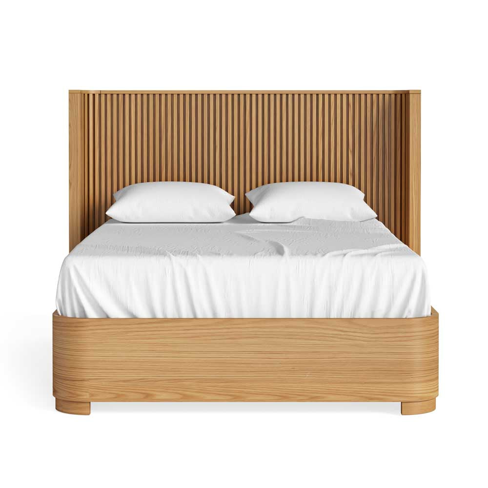 Wooden bed with white bedding on a white background