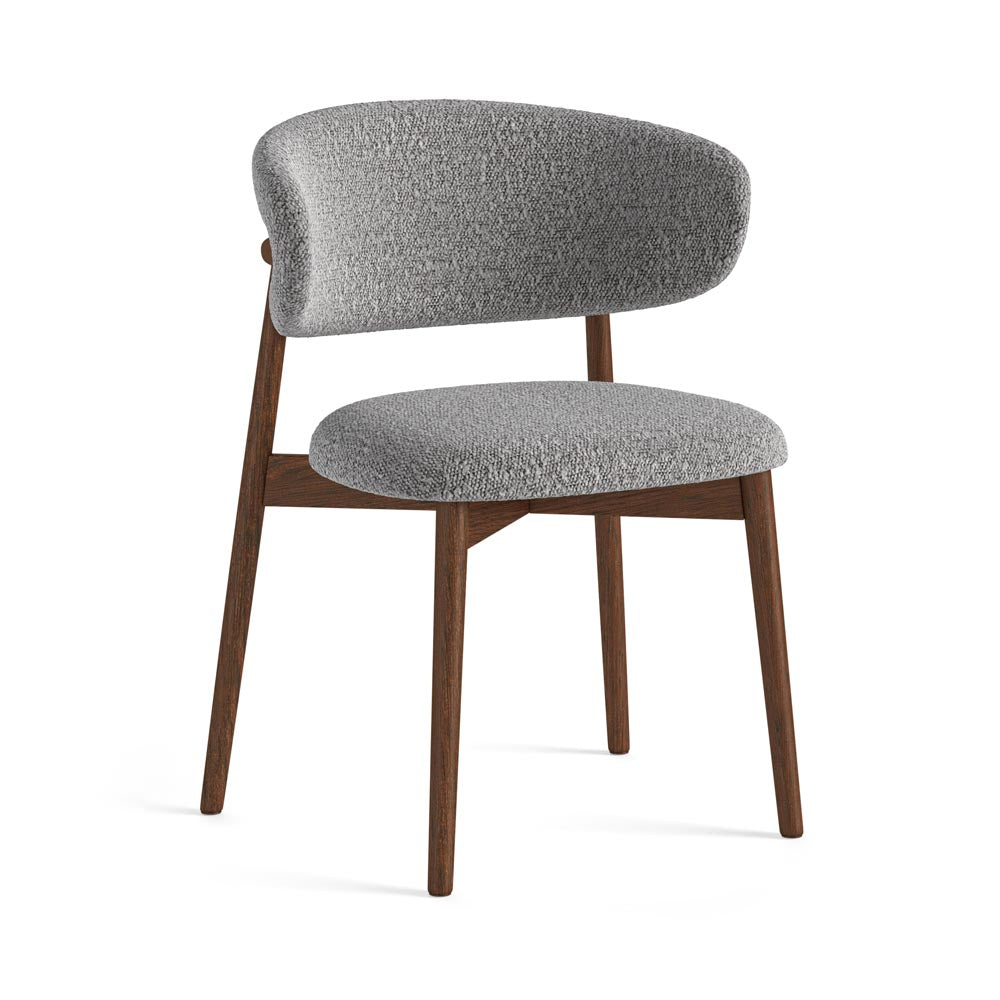 Gray upholstered chair with wooden legs on a white background