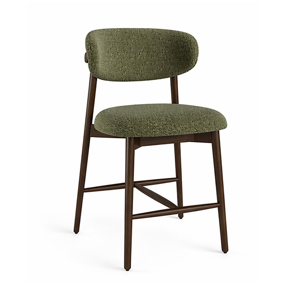 Moss green boucle upholstered bar stool with dark wooden legs on a white background