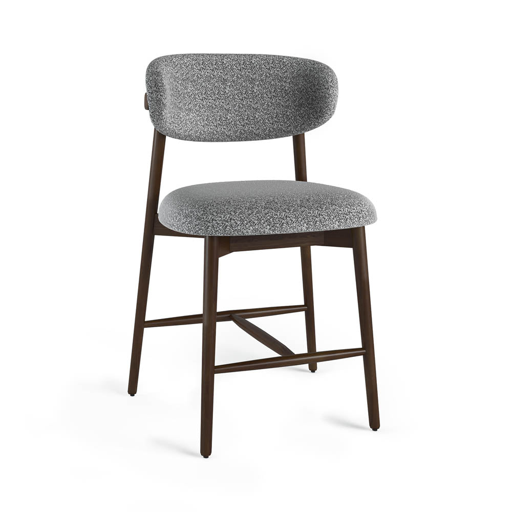 Gray upholstered chair with wooden legs on a white background