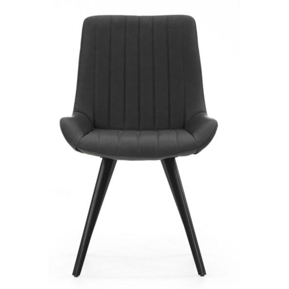 A modern black upholstered dining chair with a vertically ribbed backrest and seat, supported by four tapered black legs, shown against a plain white background.