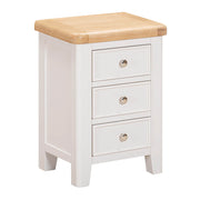 Light grey-beige nightstand with three drawers and a wooden top on a white background