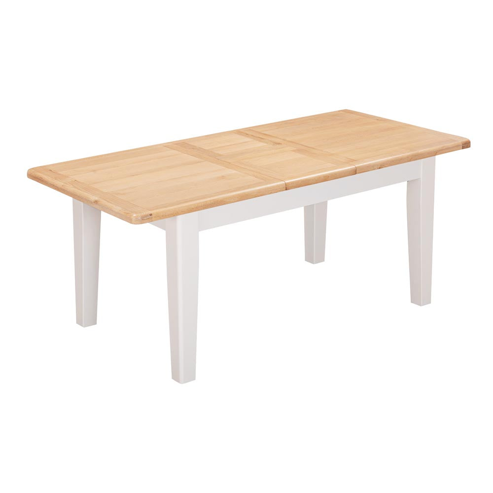 Wooden extending dining table with ight grey-beige legs on a white background