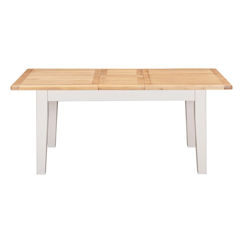 Wooden table with light grey-beige base on a white background