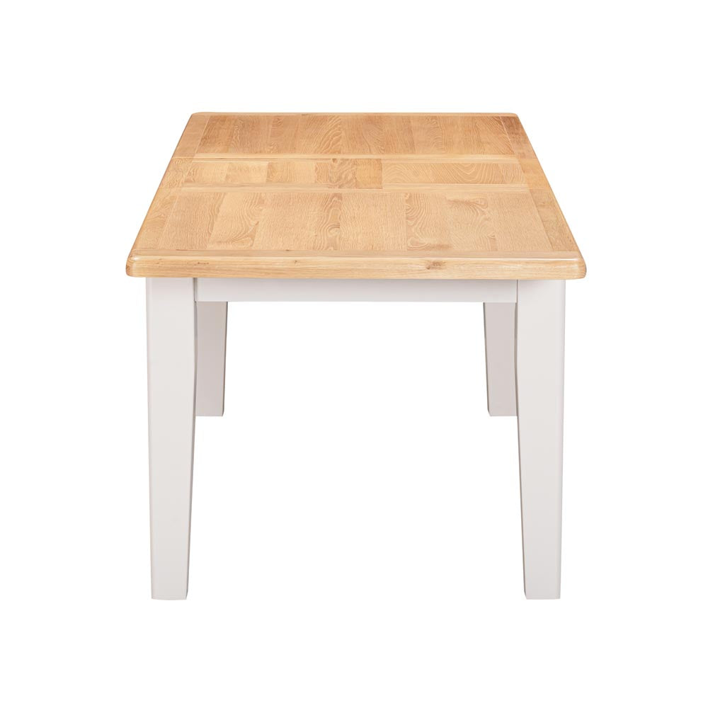 Wooden table with ight grey-beige legs on a white background