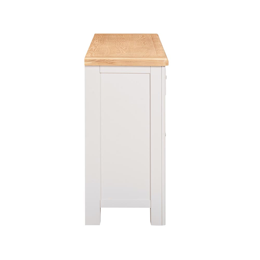 Side view of a ight grey-beige sideboard with a wooden top on a white background