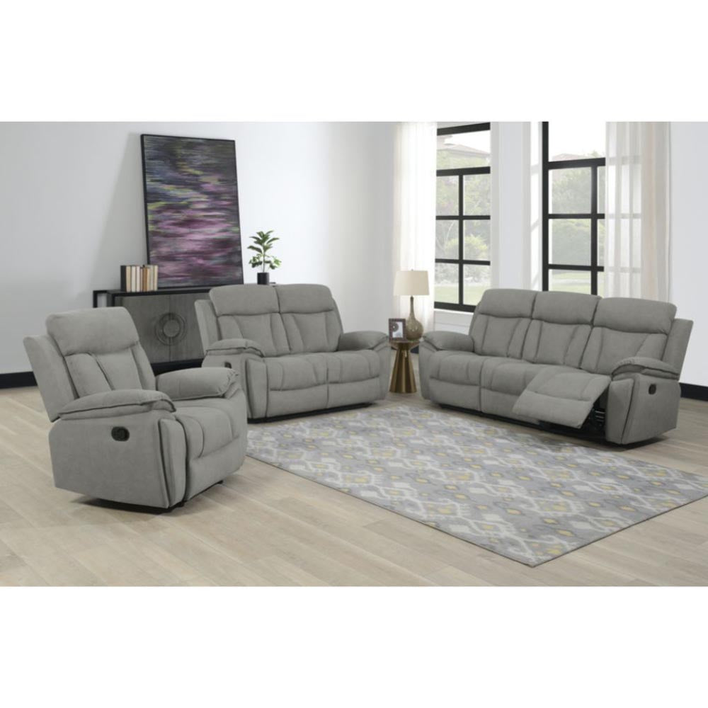 Suite of grey reclining furniture. A reclining armchair, two seater and three seater recliners in a living room