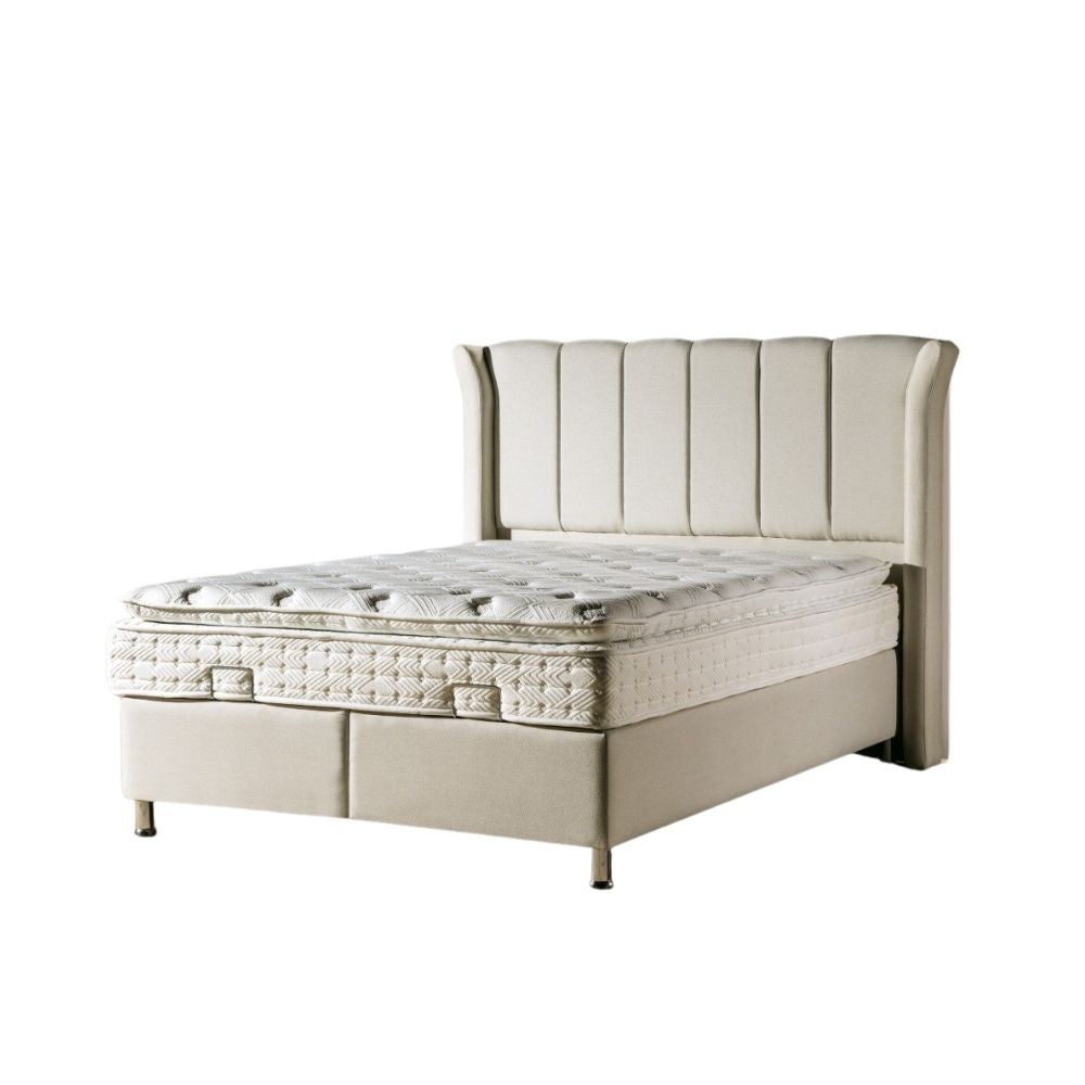 Beige ottoman divan bedframe with mattress on a white background