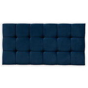 Navy blue tufted headboard on a white background