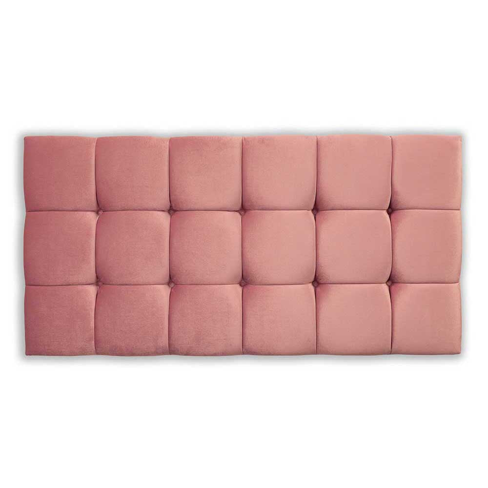 Pink velvet tufted headboard on a white background