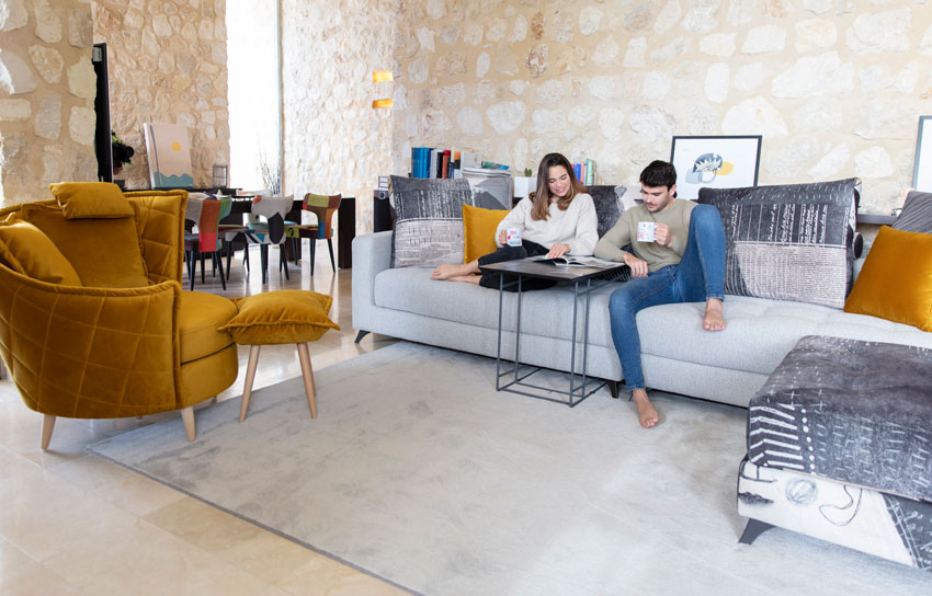 Volta Gold Colour ArmChair and Manacor Sofa with models By Fama