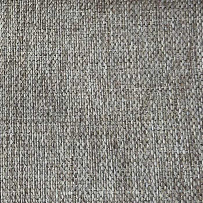 Close-up of a textured beige fabric surface
