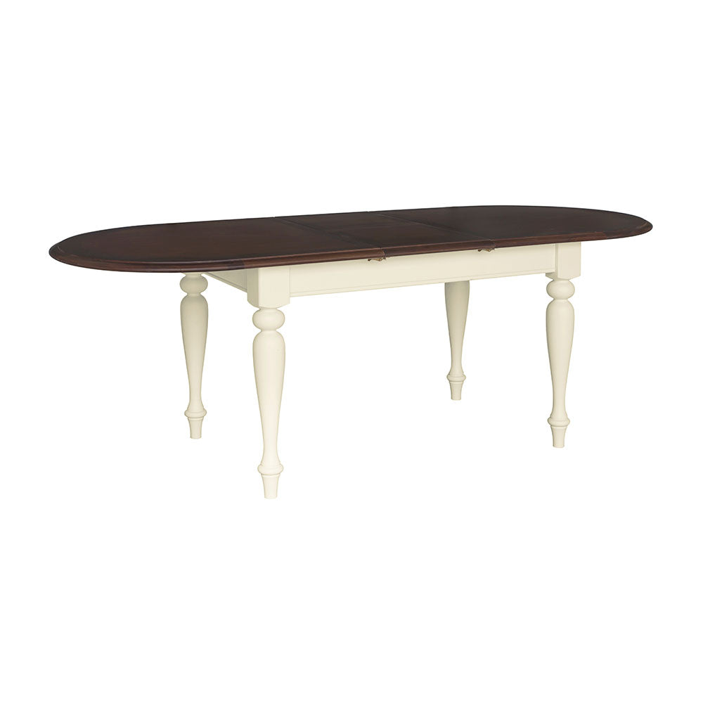Dining table with dark brown top and white legs on a white background