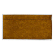 Tumeric (mustard yellow) velvet headboard on a white background 