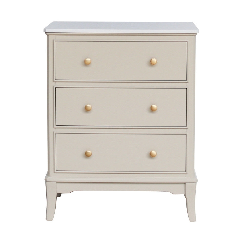 Beige / stone coloured 3 drawer dresser with gold knobs on a white background