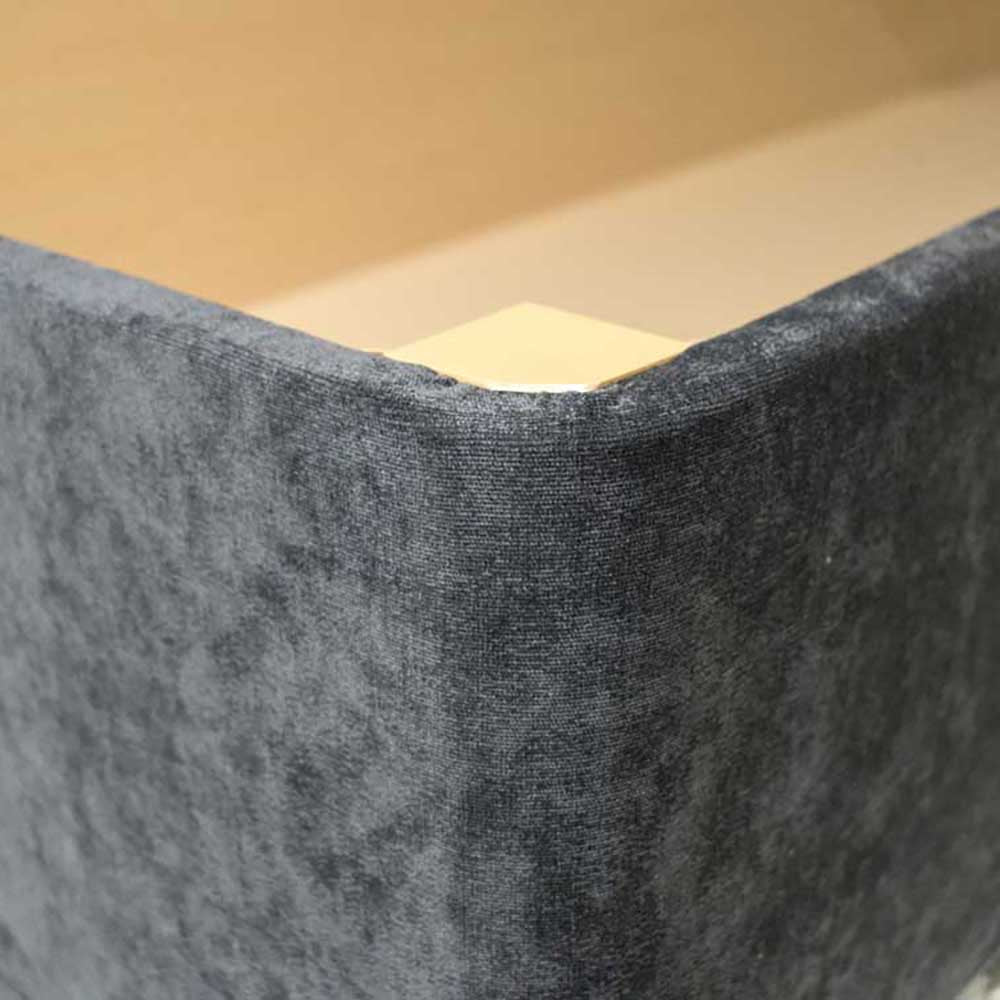Close-up of a textured gray fabric surface