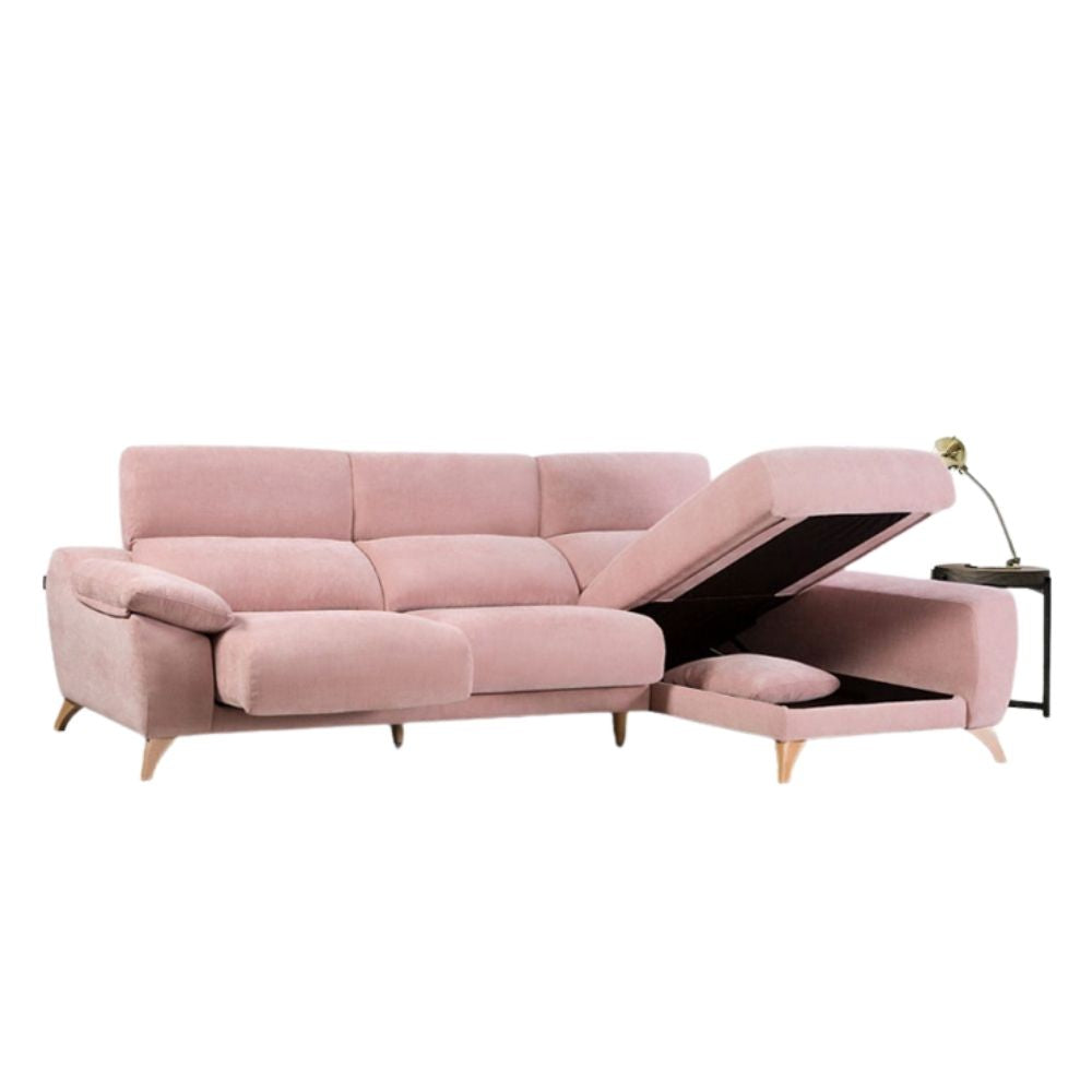 Pink sectional sofa with reclining feature on a white background
