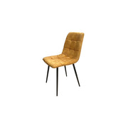 Yellow velvet dining chair with black legs on a white background