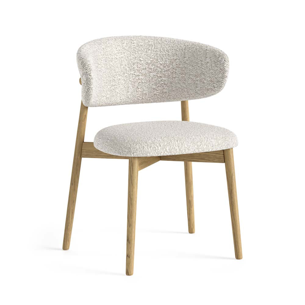 Chair with white bouclé fabric upholstered seat and backrest on a white background