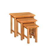 Set of three wooden nesting tables on a white background