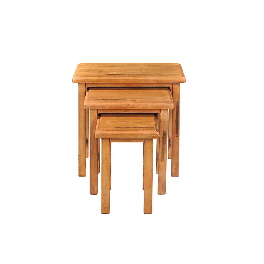 Set of three wooden nesting tables on a white background
