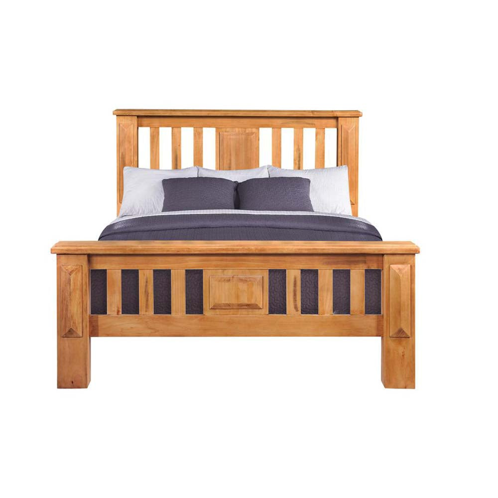Pine bed with bedding on a white background