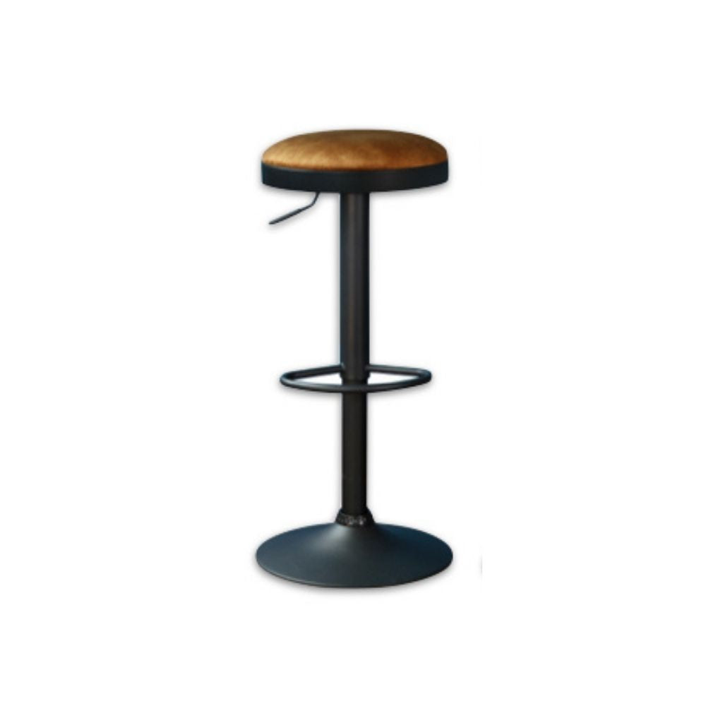 Bar stool with rust coloured upholstered seat and black metal frame on a white background