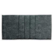 Petrol upholstered headboard with a textured finish on a white background