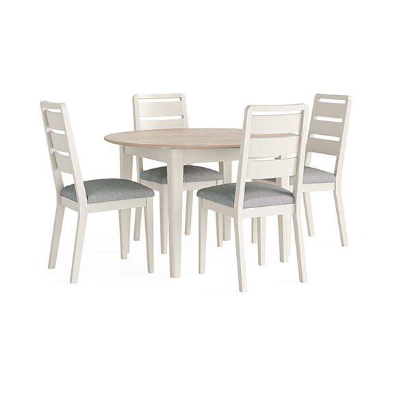 Image of round oak dining table with 4 matching white oak painted dining chairs.