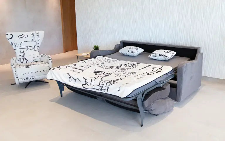 Sofa bed with cartoon design in a room setting