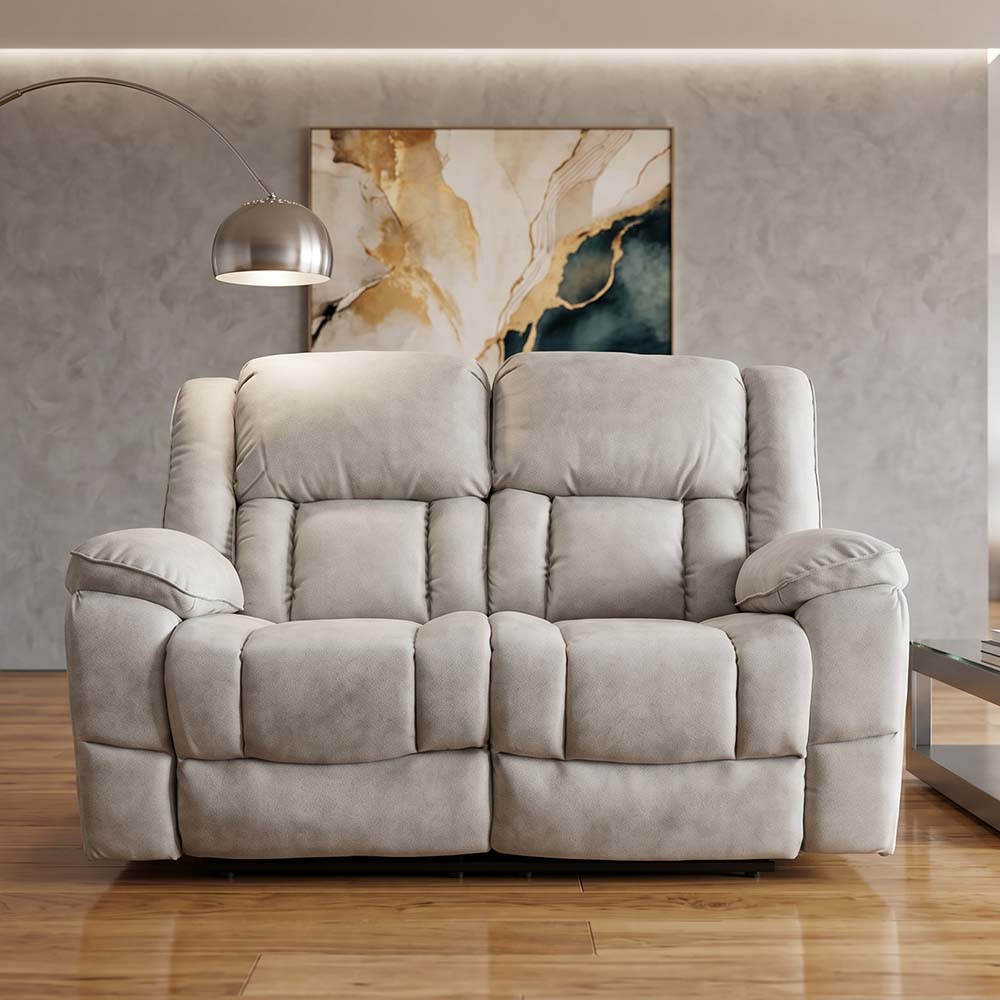Gray sofa in a living room with abstract art on the wall.