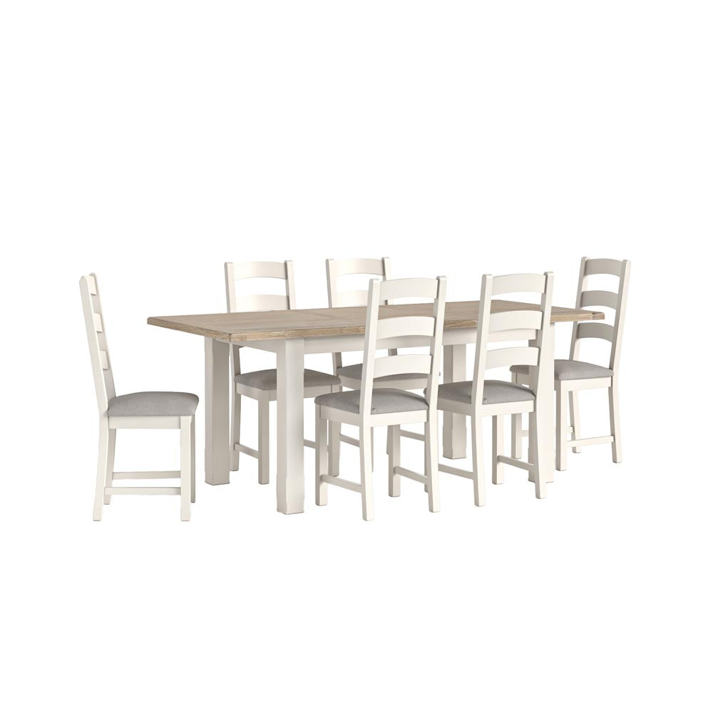 White dining table with six matching chairs on a white background