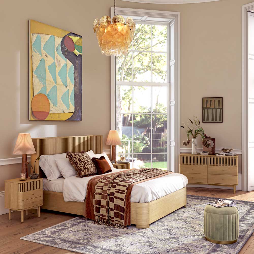 Modern bedroom with wooden furniture, artwork, and decorative elements.