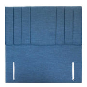 Blue fabric headboard with pleated design on a white background