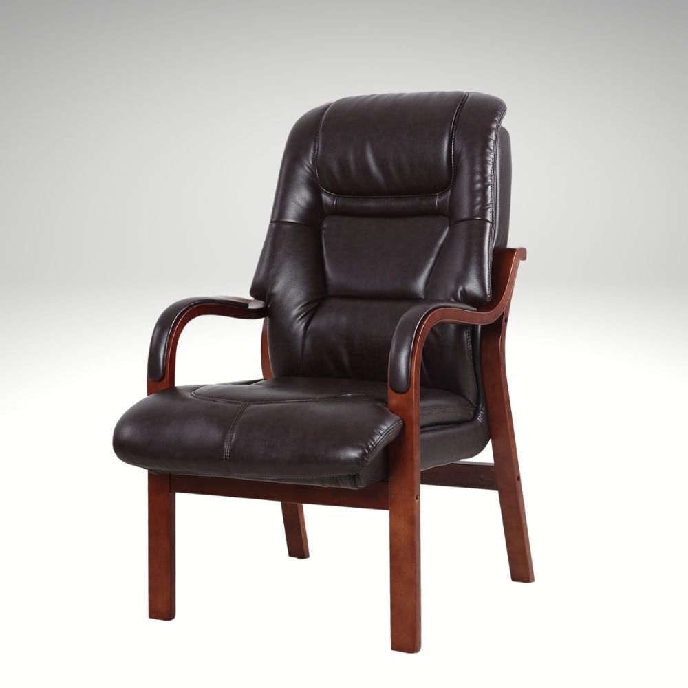 Brown leather armchair with wooden armrests on a white background