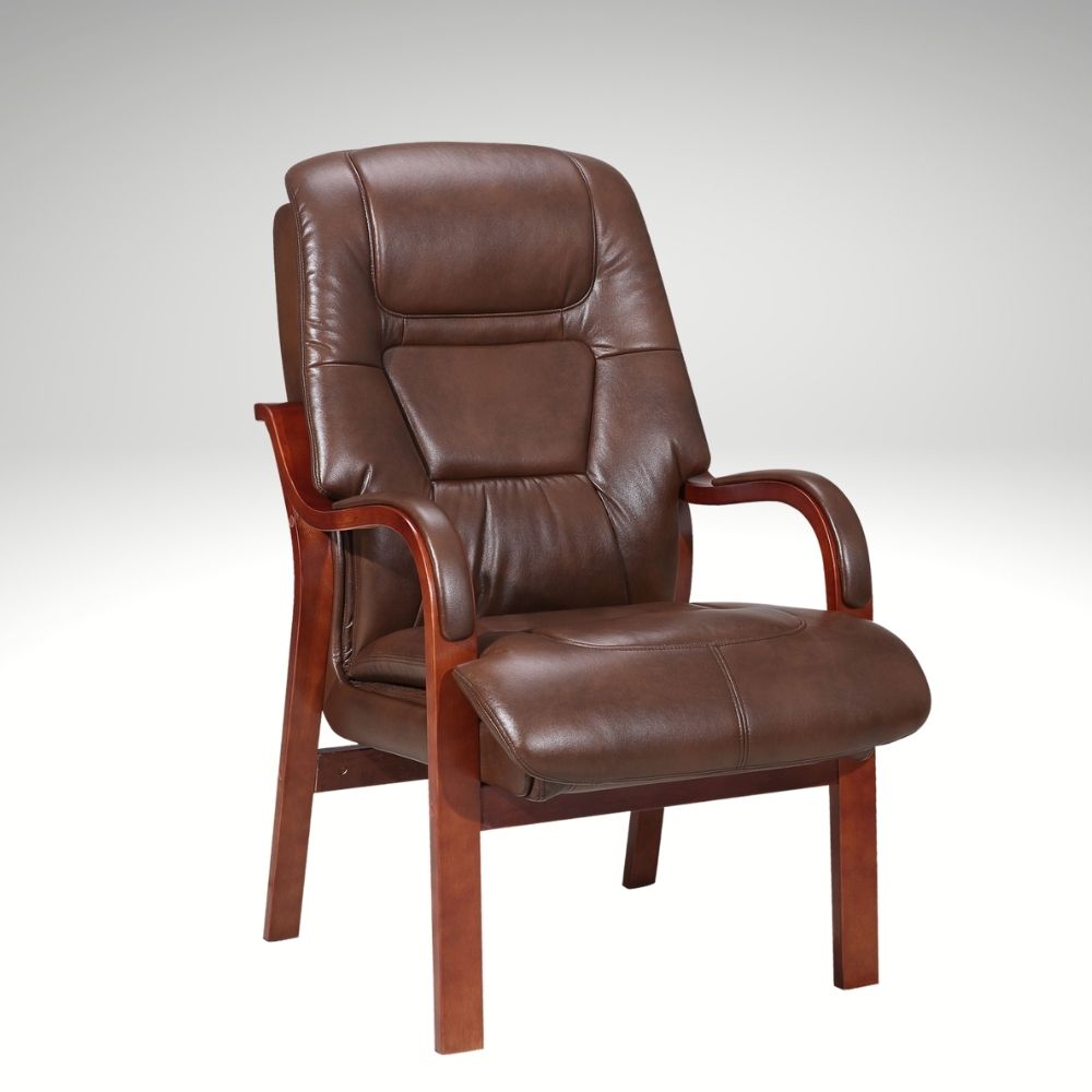 Tan leather armchair with wooden armrests on a white background
