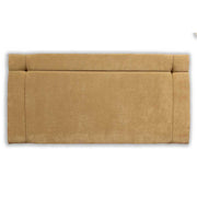 Beige upholstered headboard on a white background