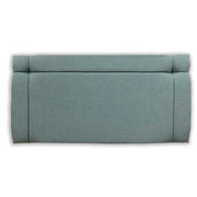 Jade upholstered headboard on a white background