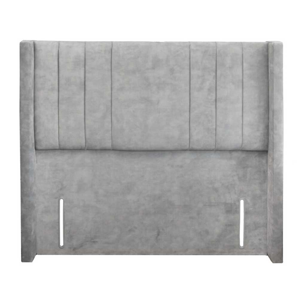 Gray upholstered winged headboard on a white background