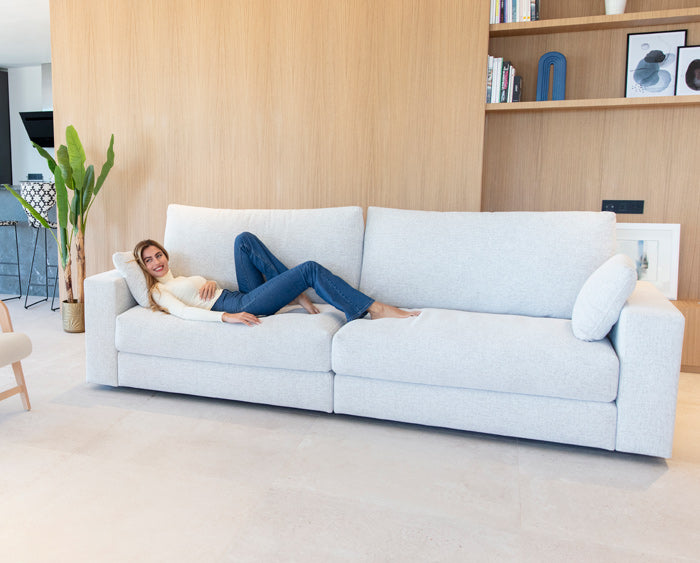 Hector Sofa by Fama with Model lying down