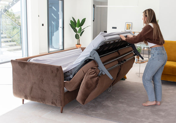 Helsinki Sofa Bed by Fama at it's final stage of recling into it's bed form.