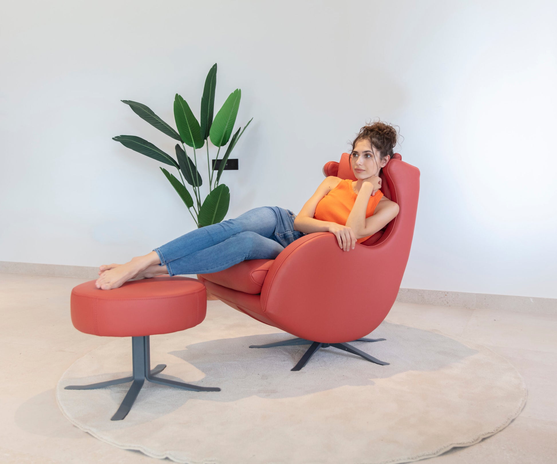 Lenny Red Leather Chair by Fama with model