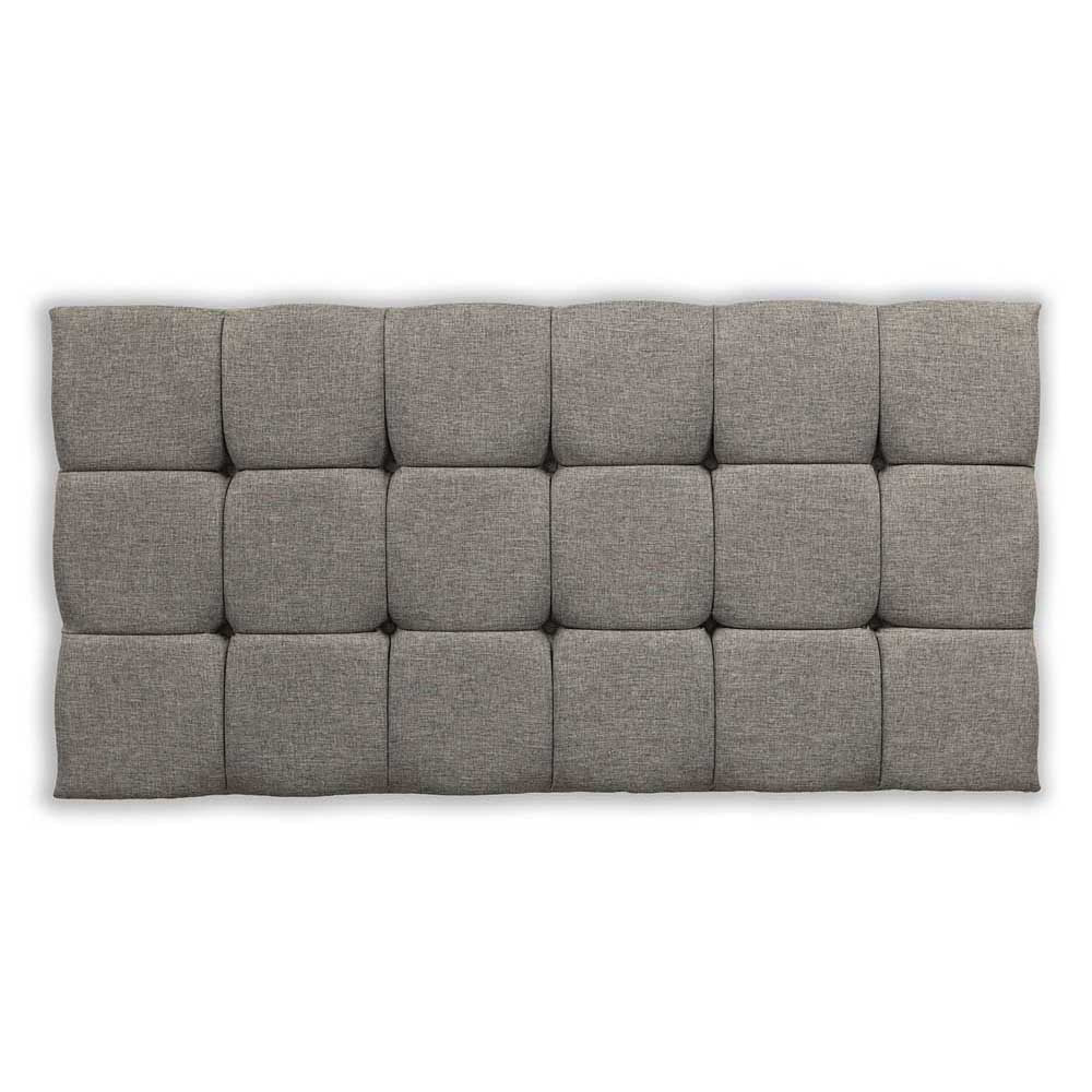 Silver tufted headboard on a white background