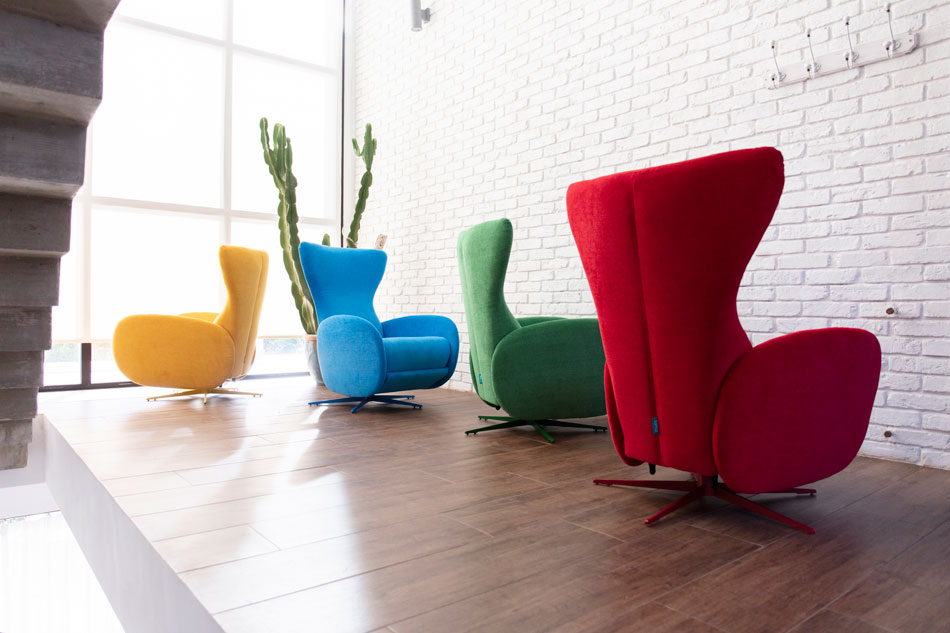 Mondrian swivel and manual reclining armchair by Fama upholstered in different colours