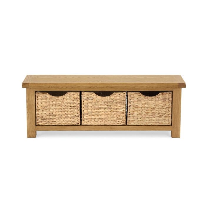 oack seating bench with 3 woven baskets undeneath for storage.
