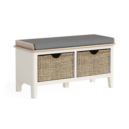 white painted oak storage bench, with grey cushion for sitting on and 2 swoven torage baskets beneath the seat.